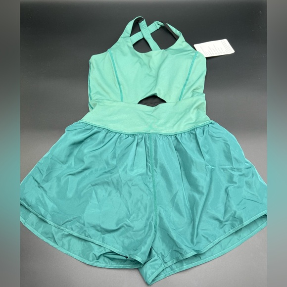 Women’s‎ Wenlia romper. Size Small. Two toned green. Keyhole cut out in front - Picture 1 of 5
